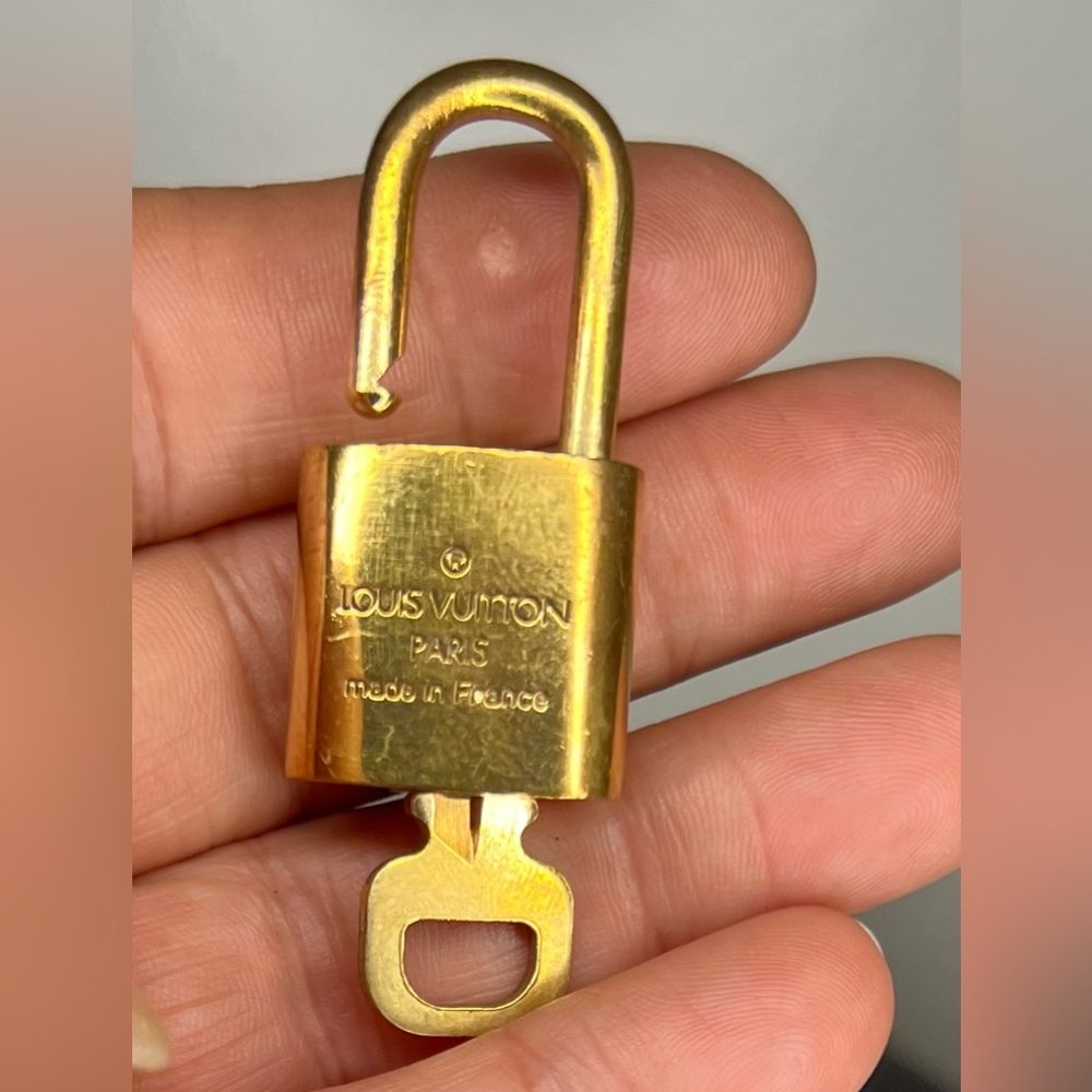 Authentic Louis Vuitton Lock
and Key #319